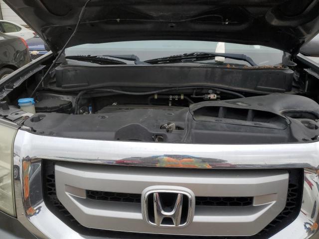 Photo 12 from auction – 2011 HONDA PILOT TOUR with VIN 5FNYF4H9XBB069942