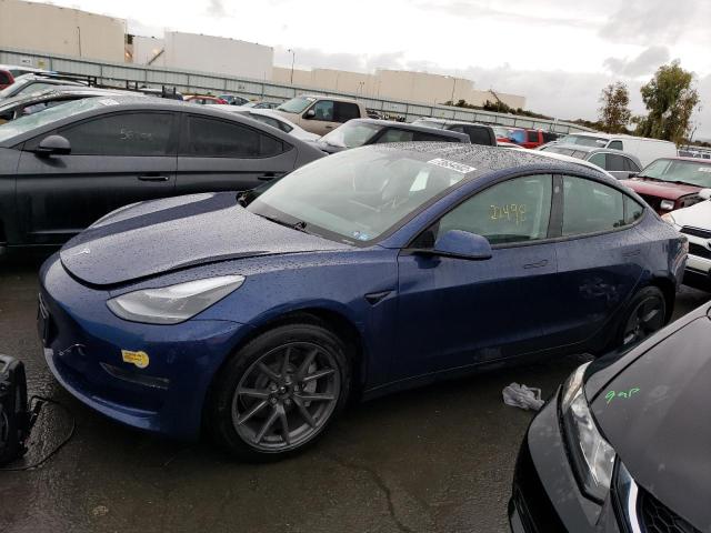 TESLA MODEL 3 2022 with VIN 5YJ3E1EB2NF174692 - Photo from auction