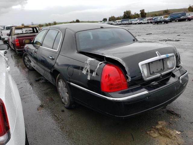 Photo 2 from auction – 2005 LINCOLN TOWN CAR E with VIN 1LNHM84W75Y661095