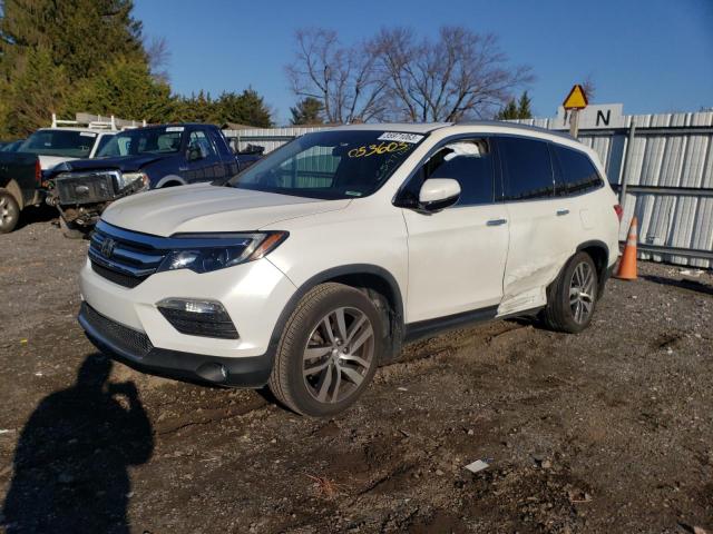 HONDA PILOT TOUR 2016 with VIN 5FNYF5H90GB053603 - Photo from auction