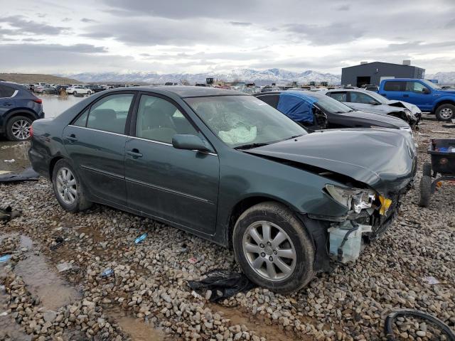 Photo 4 from auction – 2002 TOYOTA CAMRY LE with VIN JTDBE32K520045657