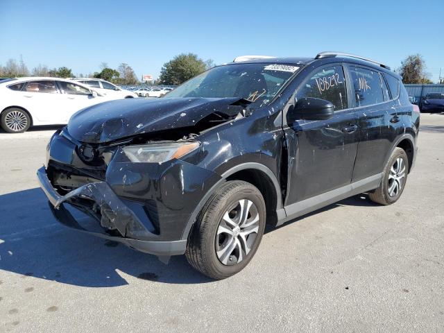 TOYOTA RAV4 LE 2017 with VIN 2T3ZFREV7HW381044 - Photo from auction