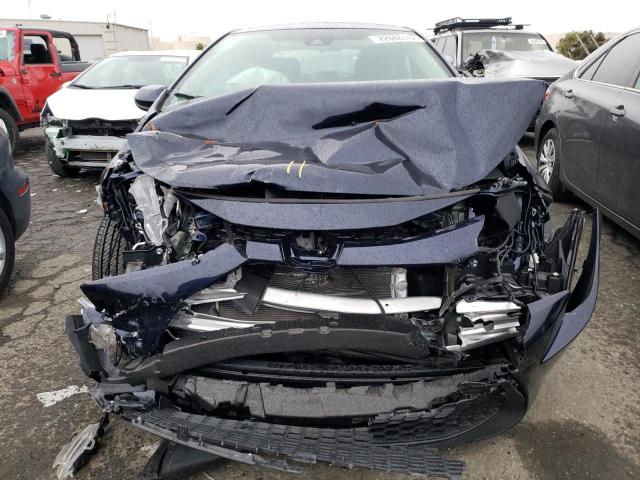 Photo 5 from auction – 2022 TOYOTA COROLLA LE with VIN 5YFEPMAE2NP319495