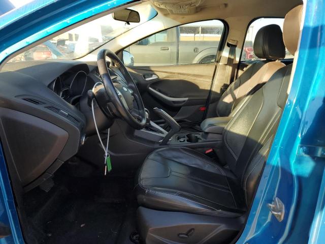 Foto 7 de la subasta – 2014 FORD FOCUS SE con VIN 1FADP3K22EL108581