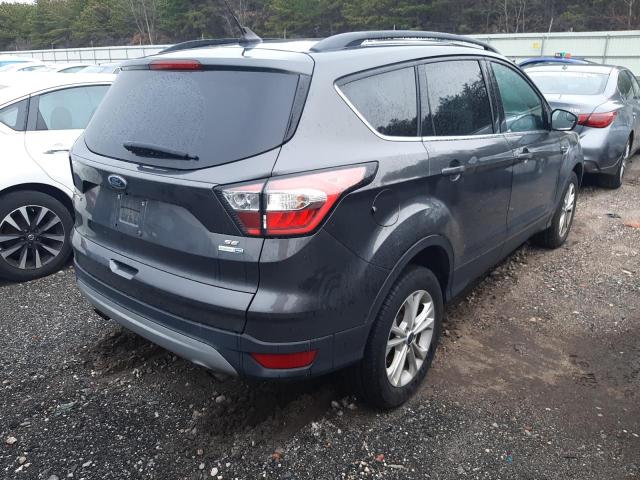 Photo 3 from auction – 2018 FORD ESCAPE SE with VIN 1FMCU9GD9JUD33074