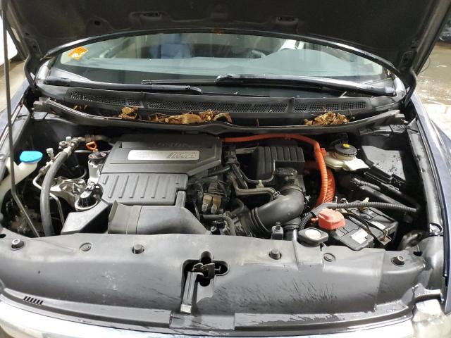 Photo 11 from auction – 2006 HONDA CIVIC HYBR with VIN JHMFA36216S024305