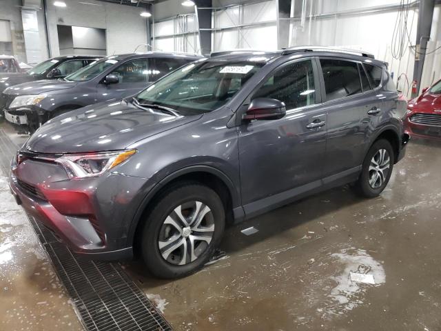 TOYOTA RAV4 LE 2018 with VIN 2T3BFREV0JW857965 - Photo from auction