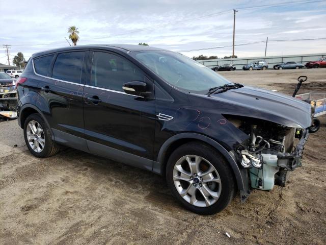 Photo 4 from auction – 2013 FORD ESCAPE SEL with VIN 1FMCU0HX1DUD58317