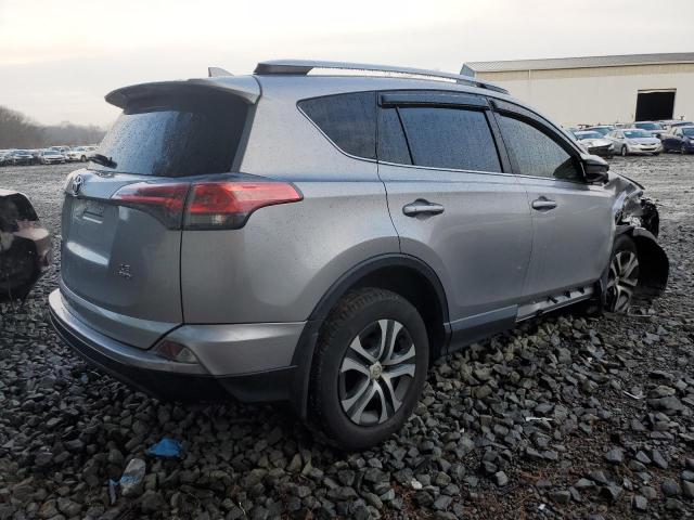 Photo 3 from auction – 2018 TOYOTA RAV4 LE with VIN JTMBFREV9JJ216134