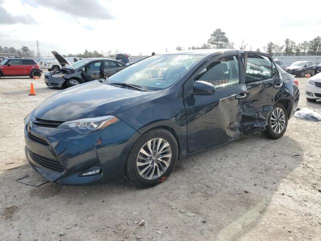 TOYOTA COROLLA L 2018 with VIN 2T1BURHE8JC993594 - Photo from auction