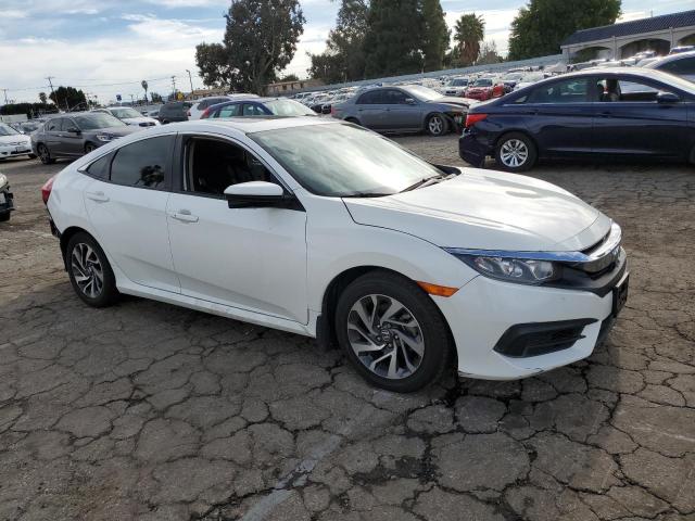 Photo 4 from auction – 2017 HONDA CIVIC EX with VIN 2HGFC2F74HH529512