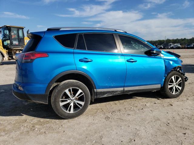 Photo 3 from auction – 2017 TOYOTA RAV4 XLE with VIN JTMWFREV3HD097877