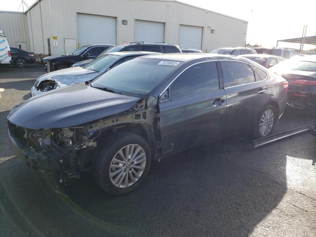 TOYOTA AVALON HYB 2015 with VIN 4T1BD1EB3FU040986 - Photo from auction