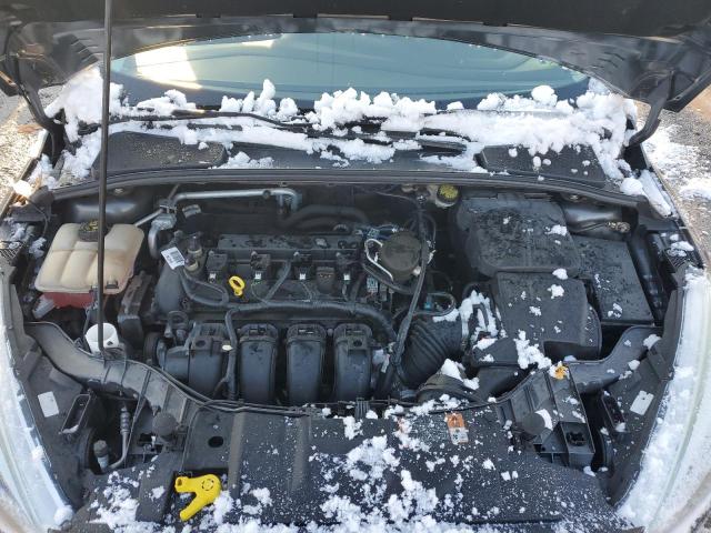 Photo 11 from auction – 2015 FORD FOCUS S with VIN 1FADP3E24FL321027