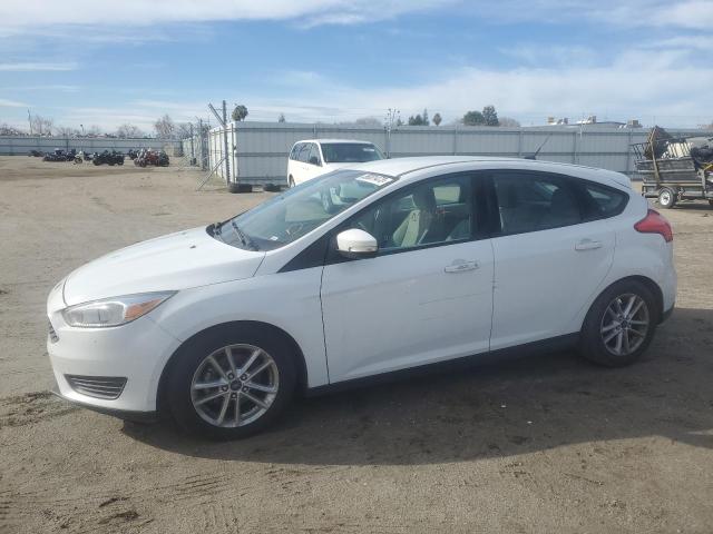 FORD FOCUS SE 2016 with VIN 1FADP3K29GL369919 - Photo from auction