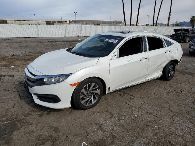 HONDA CIVIC EX 2017 with VIN 2HGFC2F74HH529512 - Photo from auction