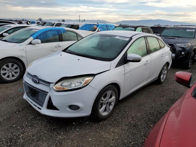 FORD FOCUS SE 2014 with VIN 1FADP3F22EL407515 - Photo from auction