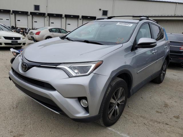 TOYOTA RAV4 ADVEN 2018 with VIN 2T3RFREV6JW738879 - Photo from auction