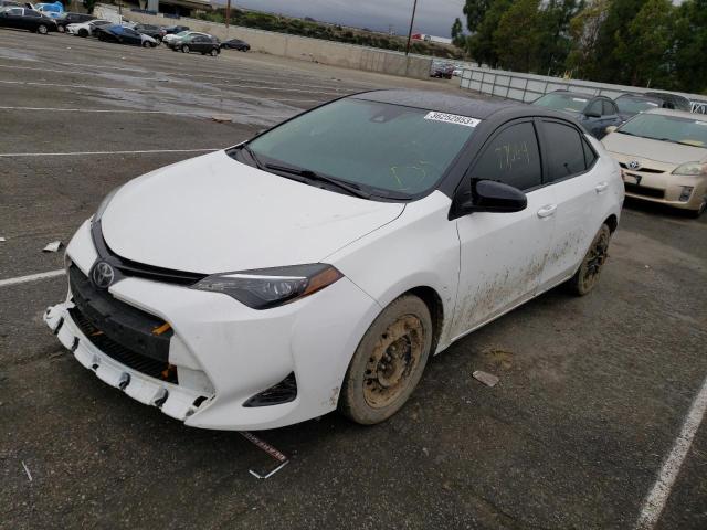 TOYOTA COROLLA L 2018 with VIN 2T1BURHE1JC052844 - Photo from auction