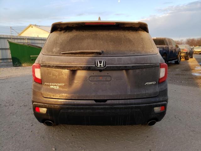 Photo 6 from auction – 2021 HONDA PASSPORT E with VIN 5FNYF8H50MB021406