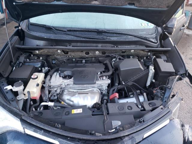 Photo 12 from auction – 2018 TOYOTA RAV4 LE with VIN JTMBFREV1JD248011
