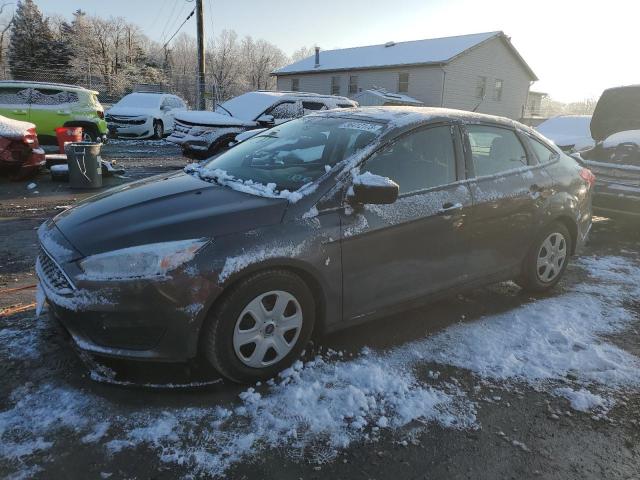 FORD FOCUS S 2015 with VIN 1FADP3E24FL321027 - Photo from auction