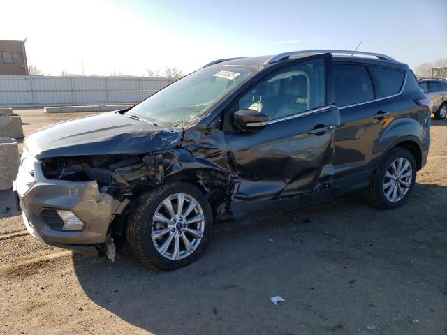 FORD ESCAPE TIT 2017 with VIN 1FMCU9JD7HUC57860 - Photo from auction