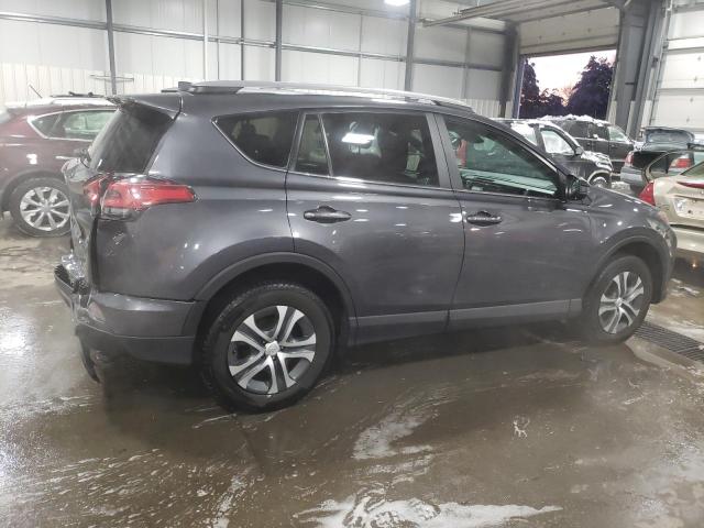 Photo 3 from auction – 2018 TOYOTA RAV4 LE with VIN 2T3BFREV0JW857965