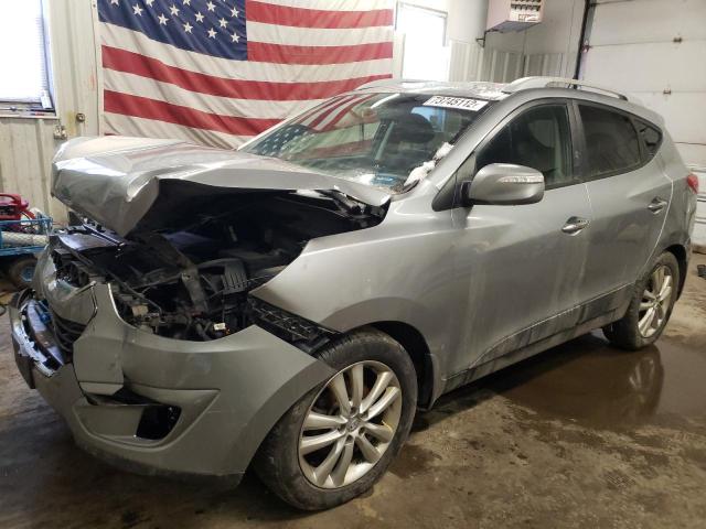 HYUNDAI TUCSON GLS 2011 with VIN KM8JUCACXBU146464 - Photo from auction