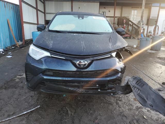 Photo 5 from auction – 2018 TOYOTA RAV4 LE with VIN JTMBFREV1JD248011
