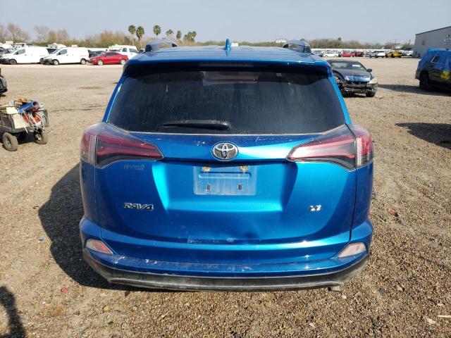 Photo 6 from auction – 2018 TOYOTA RAV4 LE with VIN JTMZFREV5JJ169294