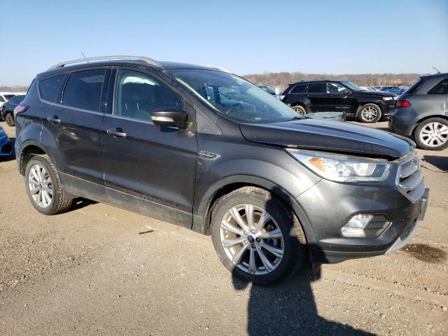 Photo 4 from auction – 2017 FORD ESCAPE TIT with VIN 1FMCU9JD7HUC57860