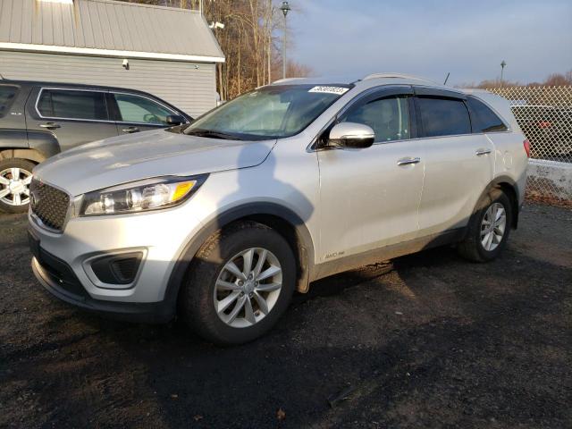 KIA SORENTO LX 2018 with VIN 5XYPGDA58JG408558 - Photo from auction