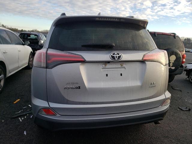 Photo 6 from auction – 2018 TOYOTA RAV4 LE with VIN JTMBFREV4JD248486
