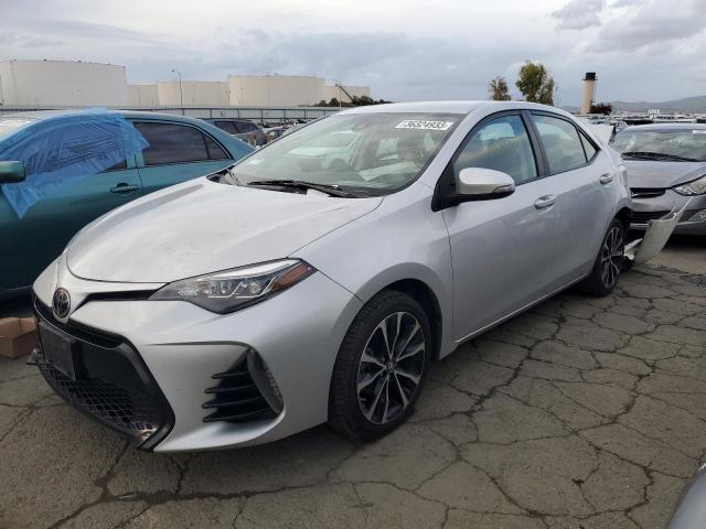 TOYOTA COROLLA L 2017 with VIN 5YFBURHE5HP715052 - Photo from auction