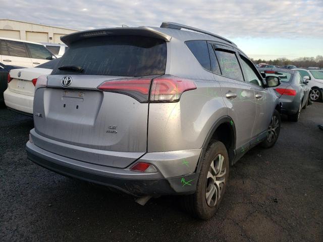 Photo 3 from auction – 2018 TOYOTA RAV4 LE with VIN JTMBFREV4JD248486