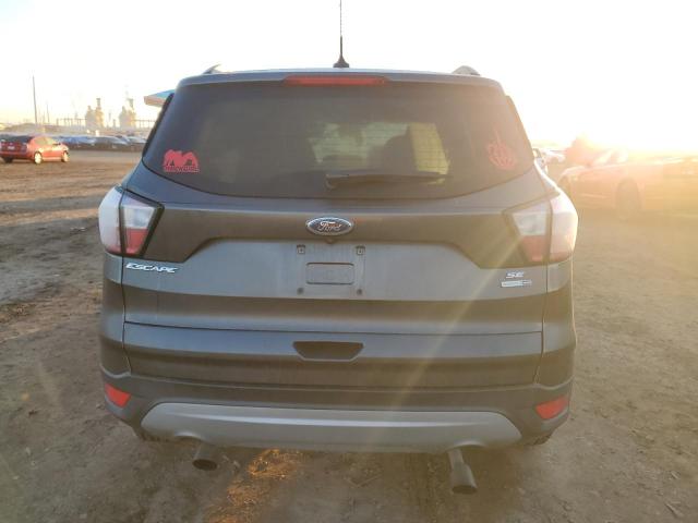 Photo 6 from auction – 2018 FORD ESCAPE SE with VIN 1FMCU9GD5JUD59428