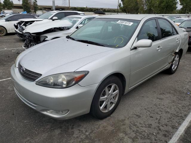TOYOTA CAMRY LE 2002 with VIN JTDBE32KX20004716 - Photo from auction