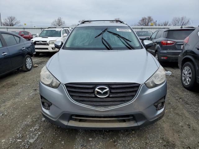 Photo 5 from auction – 2016 MAZDA CX-5 SPORT with VIN JM3KE2BE3G0686888