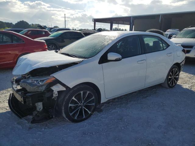 TOYOTA COROLLA L 2019 with VIN 5YFBURHE5KP913508 - Photo from auction