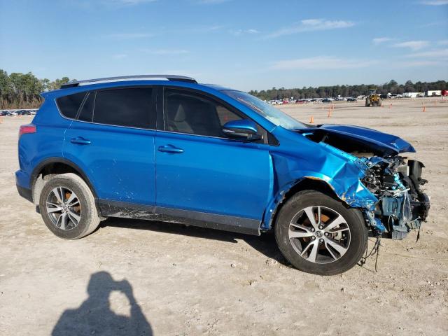 Photo 4 from auction – 2017 TOYOTA RAV4 XLE with VIN JTMWFREV3HD097877