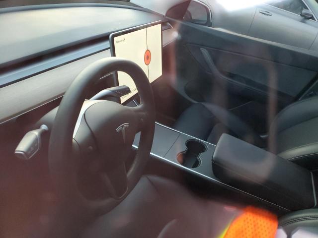 Photo 9 from auction – 2021 TESLA MODEL Y with VIN 5YJYGDEE3MF061229