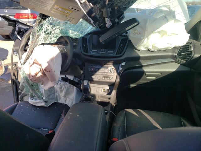Photo 8 from auction – 2019 FORD ESCAPE TIT with VIN 1FMCU9J94KUC09686