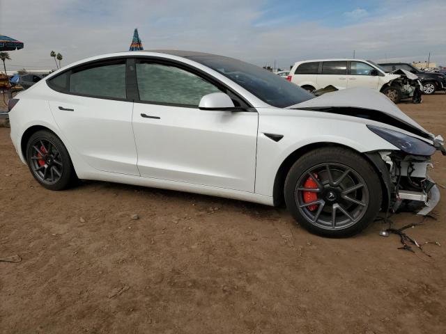 Photo 4 from auction – 2021 TESLA MODEL 3 with VIN 5YJ3E1EBXMF071678