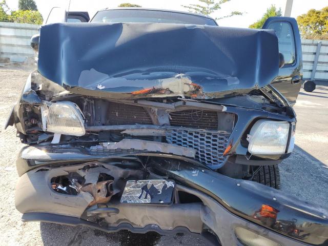 Photo 11 from auction – 2003 FORD F150 with VIN 1FTRX18L13NB16323