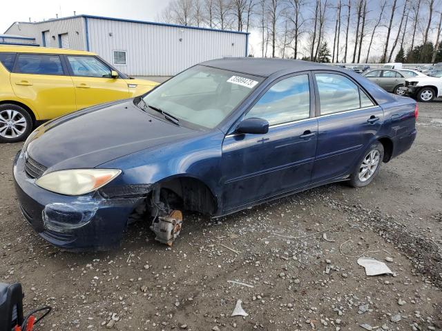 TOYOTA CAMRY LE 2004 with VIN 4T1BF32K94U067598 - Photo from auction