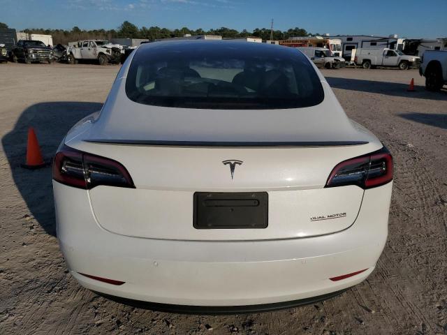 Photo 6 from auction – 2022 TESLA MODEL 3 with VIN 5YJ3E1EC2NF273960