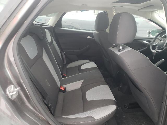 Foto 10 de la subasta – 2014 FORD FOCUS SE con VIN 1FADP3K26EL364089