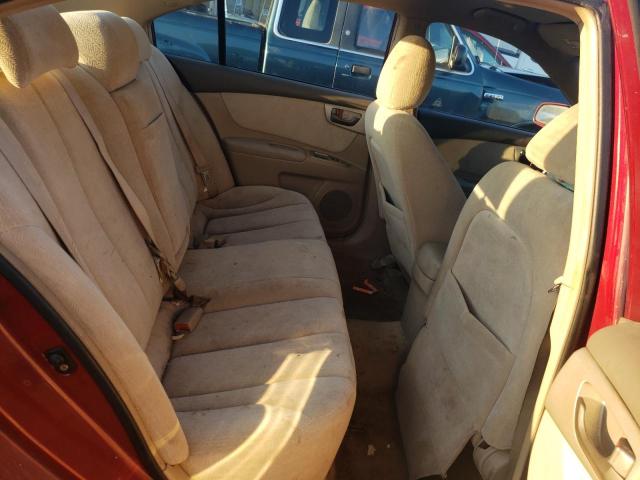 Photo 10 from auction – 2006 KIA OPTIMA LX with VIN KNAGE123765043353