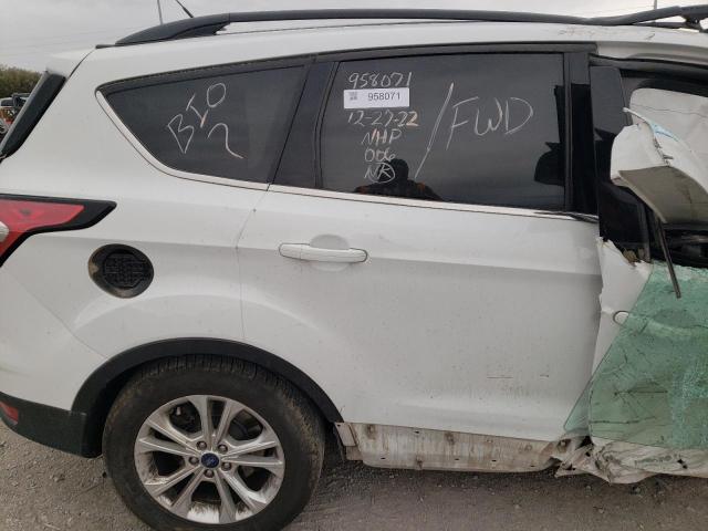 Photo 10 from auction – 2018 FORD ESCAPE SE with VIN 1FMCU9GD6JUA42063